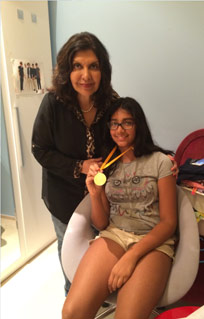 Eesha Chhabra wins a gold medal in a sports event held in her school.